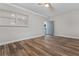 Living room with wood-look floors and shiplap wall at 701 N Grandview Ave, Daytona Beach, FL 32118