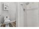 Clean bathroom with shower, toilet, and a small vanity at 701 N Grandview Ave, Daytona Beach, FL 32118