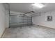 Attached garage with automatic opener and ample storage space at 11 Spruce Pass, Ocala, FL 34472