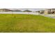 Spacious grassy lot, ready for new home construction at 1502 Jadewood Way, Kissimmee, FL 34744