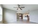 Bright dining room with kitchen view and tile flooring at 1502 Jadewood Way, Kissimmee, FL 34744