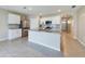 Modern kitchen with granite counters and stainless steel appliances at 1502 Jadewood Way, Kissimmee, FL 34744
