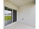 Covered patio with sliding glass doors at 1502 Jadewood Way, Kissimmee, FL 34744