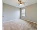 Bright bedroom with neutral walls, carpet, and window blinds at 1502 Jadewood Way, Kissimmee, FL 34744