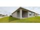Single story home with covered patio at 1502 Jadewood Way, Kissimmee, FL 34744