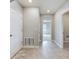 Bright hallway with tile flooring and access to other rooms at 1502 Jadewood Way, Kissimmee, FL 34744