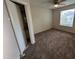 Spacious bedroom with carpet and en-suite bathroom at 1932 Lake Atriums Cir # 70, Orlando, FL 32839