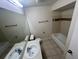 Clean condo bathroom with tub and vanity at 1932 Lake Atriums Cir # 70, Orlando, FL 32839