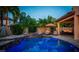 Relaxing pool and spa area with patio furniture at 11823 Otterbrooke Trl, Windermere, FL 34786