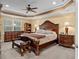 Spacious main bedroom with large bed and ample furniture at 11823 Otterbrooke Trl, Windermere, FL 34786