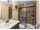 Modern bathroom with a walk-in shower and vanity at 11823 Otterbrooke Trl, Windermere, FL 34786