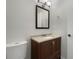 Updated bathroom with vanity, mirror, and toilet at 112 Winterglen Dr, Sanford, FL 32771