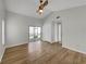 Bright bedroom featuring hardwood floors and a ceiling fan at 112 Winterglen Dr, Sanford, FL 32771