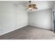 Spacious bedroom with ceiling fan and neutral carpeting at 112 Winterglen Dr, Sanford, FL 32771