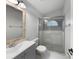 Updated bathroom with gray vanity and a walk-in shower at 112 Winterglen Dr, Sanford, FL 32771