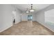 Spacious living area with tile floors and ceiling fan at 112 Winterglen Dr, Sanford, FL 32771