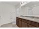 Bathroom with double vanity and granite countertop at 607 Alder Ln, Auburndale, FL 33823