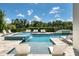 Relaxing pool and spa with a view of the golf course at 925 Desert Mountain Ct, Reunion, FL 34747