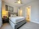 Bright bedroom with a comfortable bed and ensuite bathroom at 7740 Sandy Ridge Dr # 100, Reunion, FL 34747