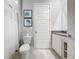 Clean and modern bathroom with shower and toilet at 7740 Sandy Ridge Dr # 100, Reunion, FL 34747