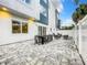 Spacious patio with dining table and chairs, ideal for outdoor dining and gatherings at 7740 Sandy Ridge Dr # 100, Reunion, FL 34747