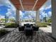 Covered patio overlooking the community pool and amenities at 7740 Sandy Ridge Dr # 100, Reunion, FL 34747