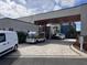 Building entrance with covered drop off area at 7740 Sandy Ridge Dr # 100, Reunion, FL 34747