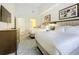 Two queen beds, TV, dresser, and modern decor at 14501 Grove Resort Ave # 3132, Winter Garden, FL 34787
