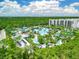 Aerial view of resort-style pool and surrounding amenities at 14501 Grove Resort Ave # 3132, Winter Garden, FL 34787