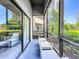 Relaxing screened balcony with outdoor seating at 14501 Grove Resort Ave # 3132, Winter Garden, FL 34787