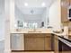 Kitchen features a breakfast bar and modern finishes at 14501 Grove Resort Ave # 3132, Winter Garden, FL 34787