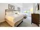 Well-lit bedroom with two queen beds and modern decor at 14501 Grove Resort Ave # 3132, Winter Garden, FL 34787