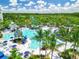 Expansive pool area with water features, loungers and palm trees at 14501 Grove Resort Ave # 3132, Winter Garden, FL 34787