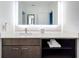 Modern bathroom with illuminated vanity mirror at 14501 Grove Resort Ave # 3132, Winter Garden, FL 34787