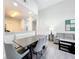 Dining area with a grey table and comfortable seating at 14501 Grove Resort Ave # 3132, Winter Garden, FL 34787