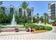Community entrance with fountain and landscaping at 14501 Grove Resort Ave # 3132, Winter Garden, FL 34787