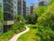 Lush landscaping and a winding walkway at 14501 Grove Resort Ave # 3132, Winter Garden, FL 34787
