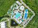 Resort-style pool with waterslides, loungers and landscaping at 14501 Grove Resort Ave # 3132, Winter Garden, FL 34787