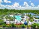 Expansive pool area with lounge chairs and umbrellas at 14501 Grove Resort Ave # 3132, Winter Garden, FL 34787