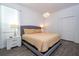 Spacious Primary bedroom with king-size bed and ensuite bathroom at 487 Marcello Blvd, Kissimmee, FL 34746