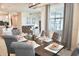 Open concept dining room with views into the kitchen and living room at 3161 Paradox Cir # 202, Kissimmee, FL 34746