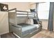 bedroom with a built in bunk bed at 3161 Paradox Cir # 202, Kissimmee, FL 34746