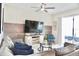 Spacious living room featuring a large TV and comfy seating at 3161 Paradox Cir # 202, Kissimmee, FL 34746