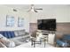 Spacious living area with large TV and comfortable seating at 3161 Paradox Cir # 202, Kissimmee, FL 34746