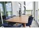 Outdoor balcony dining area with lake view at 3161 Paradox Cir # 202, Kissimmee, FL 34746