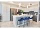 Modern kitchen with an island and stainless steel appliances at 3161 Paradox Cir # 202, Kissimmee, FL 34746