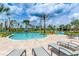 Relaxing pool area with lounge chairs at 3161 Paradox Cir # 202, Kissimmee, FL 34746