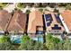 Community overview with solar panels and pools at 5424 Solterra Cir # 1, Davenport, FL 33837