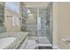 Bathroom with granite countertop and walk-in shower at 5424 Solterra Cir # 1, Davenport, FL 33837