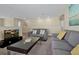 Spacious living room with comfortable sofas and a large TV at 5424 Solterra Cir # 1, Davenport, FL 33837